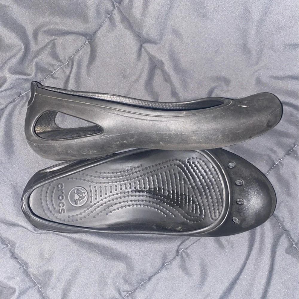 Crocs black ballet flats. Size 9